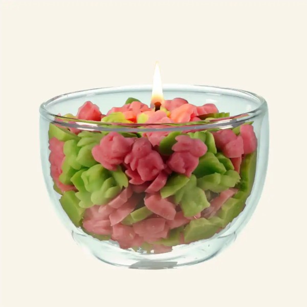 Perlagekerze für Ostern mit rosa und grünen Häschen