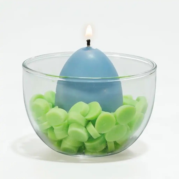 Wiener interaktive Osternest-Kerze in blau aus Raps & Olivenwachs